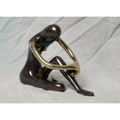 Woman in brass